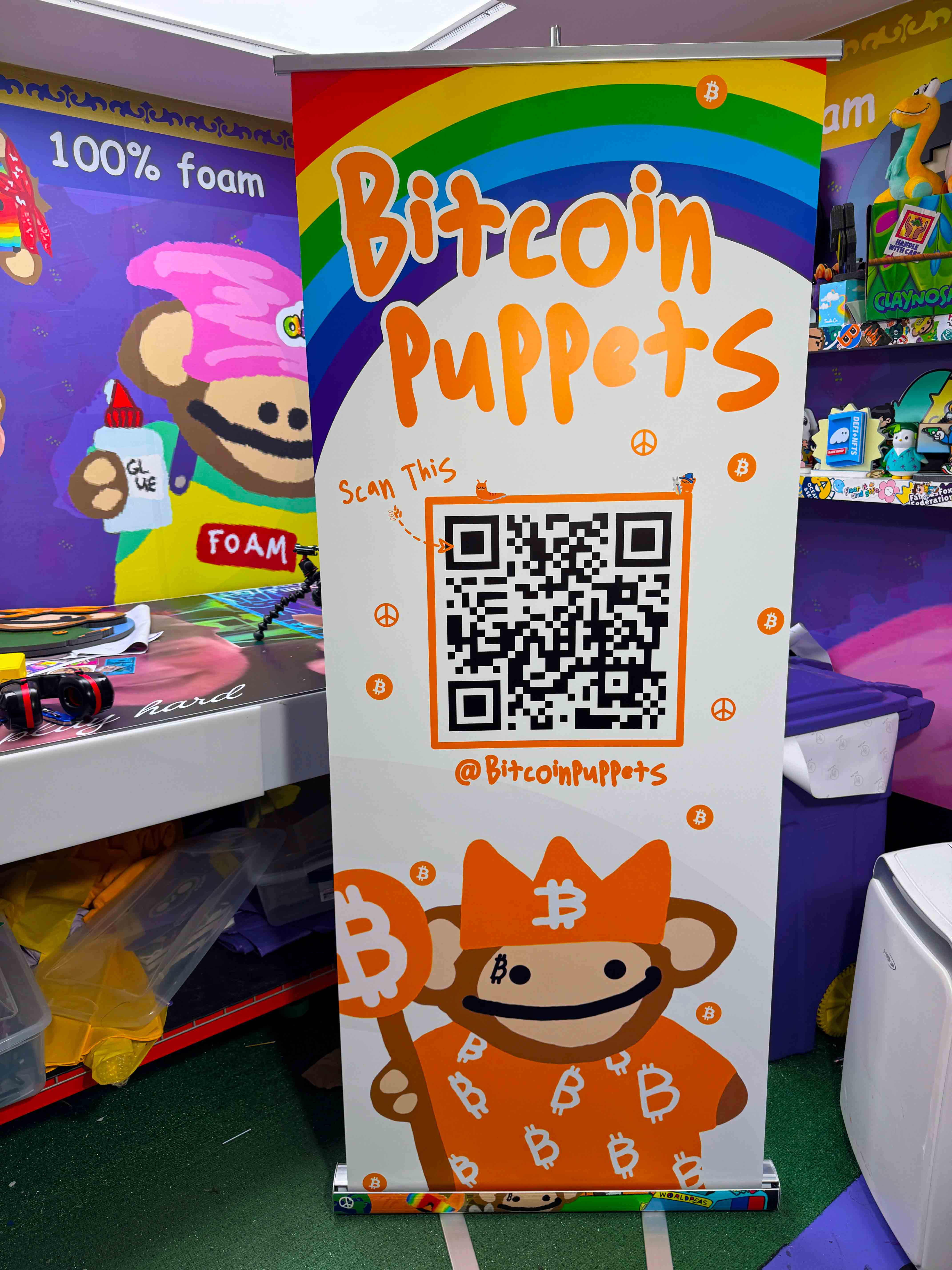 roll up banner sign used for a Bitcoin Puppets event made by foami
